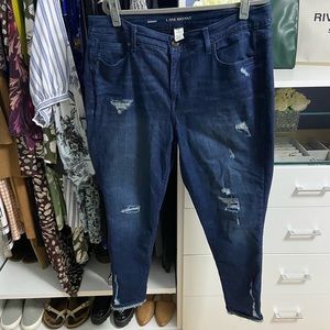 Dark blue distressed jeans